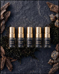 Sirta Scents Discovery Set Essence Collection featuring five signature Extrait de Parfum sample vials in a luxury cream and gold presentation box